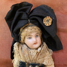 画像をギャラリービューアに読み込む, 黒リボンのミニョネット